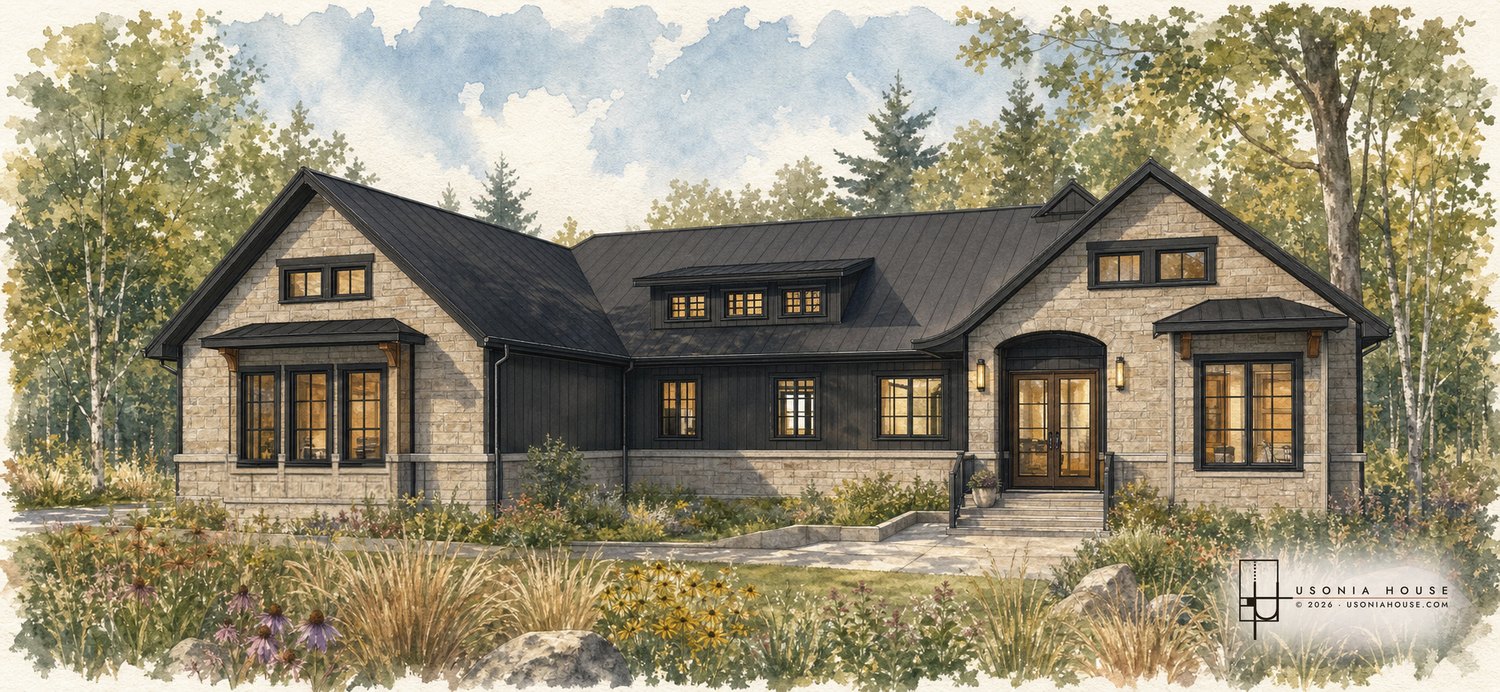 The front of the Graff Residence, limestone and dark board and batten under a standing seam roof.