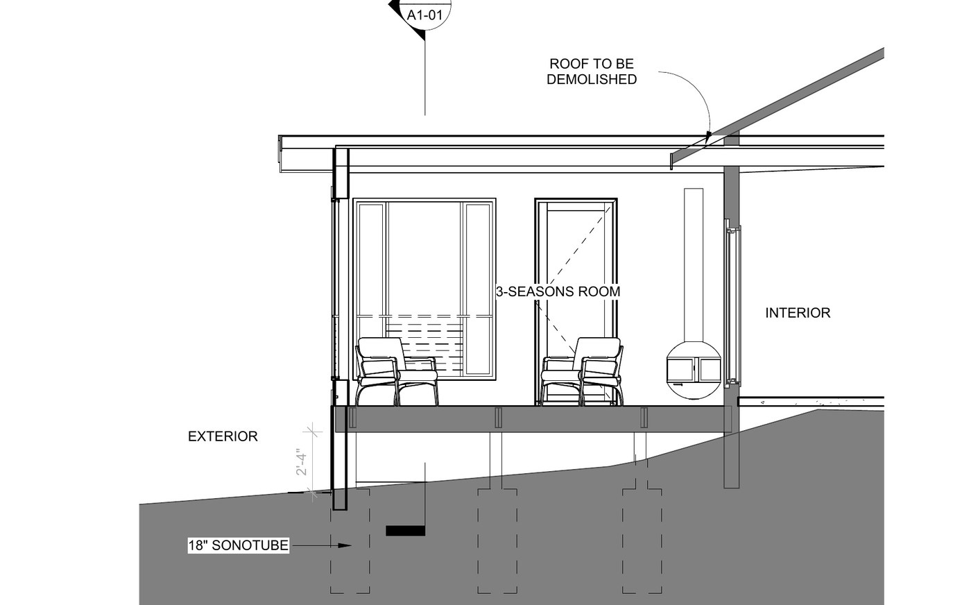 East west section through the addition showing sonotube piers, the retained deck structure and the roof to be demolished.